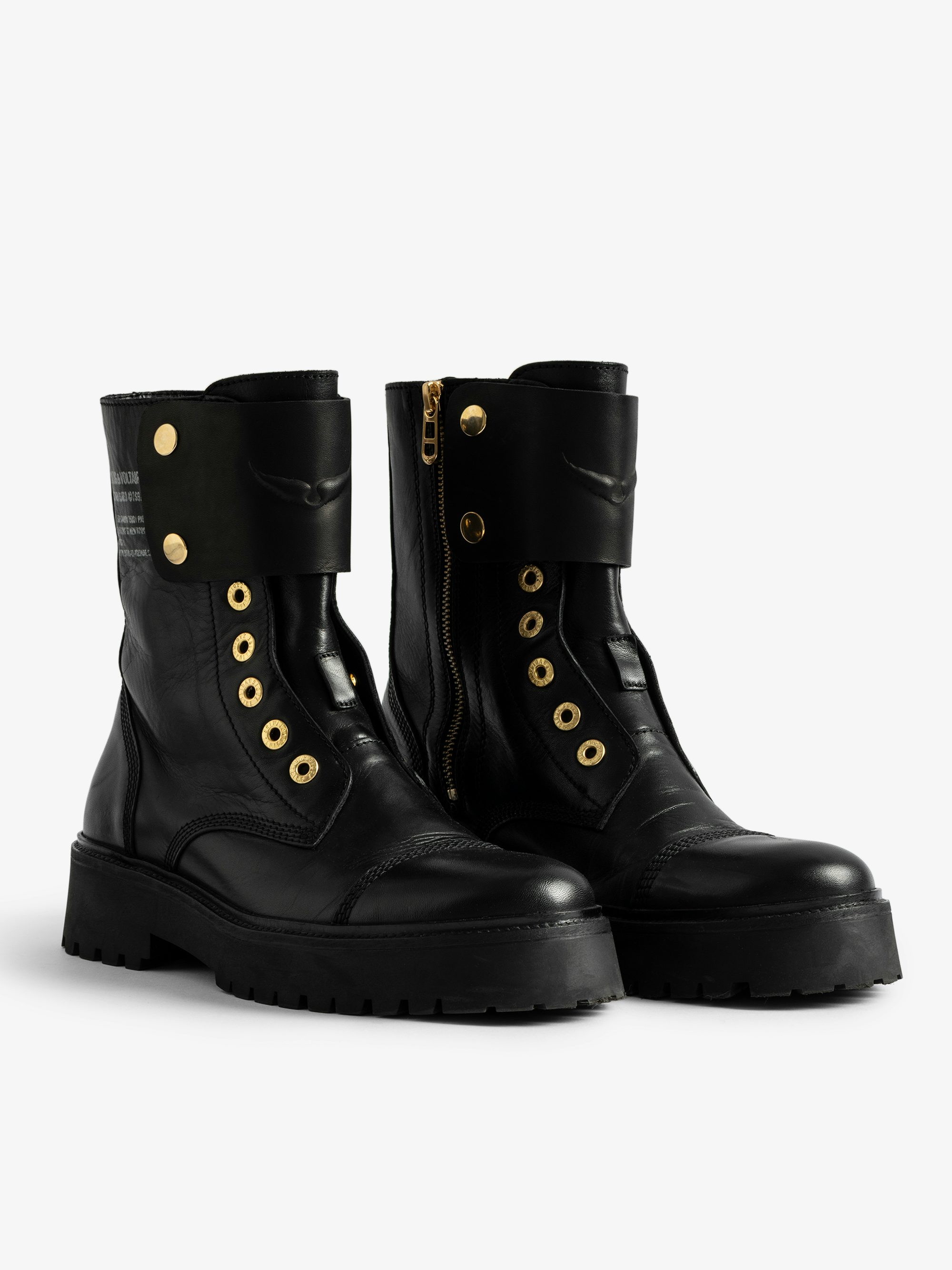 Joe Boots - Women's laceless combat boots with gold toned hardware.